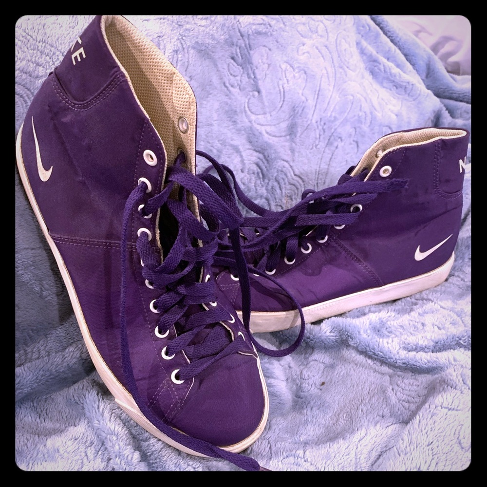 Unique pair of purple Nike high tops